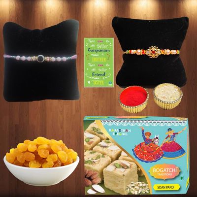 BOGATCHI Complete Rakhi Gift Set Sweets and Dry Fruits for Brother, Traditional Soan Papdi(200g) & Natural Raisins (50g) + Rakhi Greeting Card + Set of 2 Rakhi + Roli Chawal