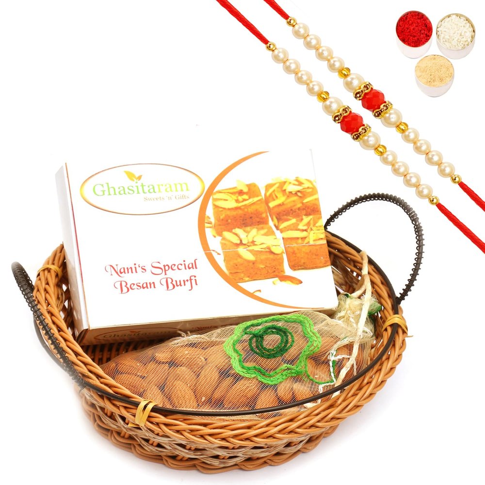 Ghasitaram Gifts Rakhi Gifts/ Rakhi Sweets - Small Cane Basket with Nani's Spl Besan Barfi and Almonds Pouch with 2 Pearl Beads Rakhis