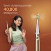 AGARO COSMIC MAX Sonic Electric tooth brush for adults with 5 modes, 7 brush heads, 1 Interdental head and rechargeable with 4 hours charge lasting up to 25 days (Champagne Gold) view 2