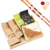 Ghasitaram Gifts Rakhi Gifts/ Rakhi Sweets - Light Wood Tray of Almonds, Raisins, Butter Chakli Banarsi Flavoured and Milk Cake with 2 Pearl Beads Rakhis view 1