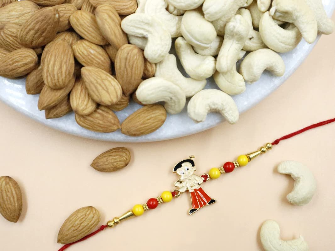 Blessing Decor Premium Kids Rakhi With Dry Fruit Gift Hamper | 100 Gram Dry Fruits Pack | Chota Bheem Metal Rakhi | Roli Chawal | With Best Wishes Greeting Card For Brother
