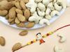 Blessing Decor Premium Kids Rakhi With Dry Fruit Gift Hamper | 100 Gram Dry Fruits Pack | Chota Bheem Metal Rakhi | Roli Chawal | With Best Wishes Greeting Card For Brother view 1