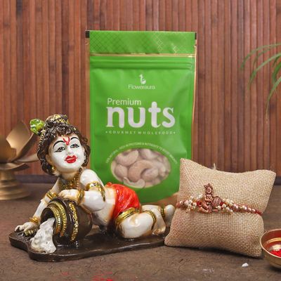 FlowerAura One Designer Fancy Rakhi With Lord Krishna God Idol Showpiece & 100gm Cashews In Pouch Gift's For Brother's RakshaBandhan (Roli & Chawal)