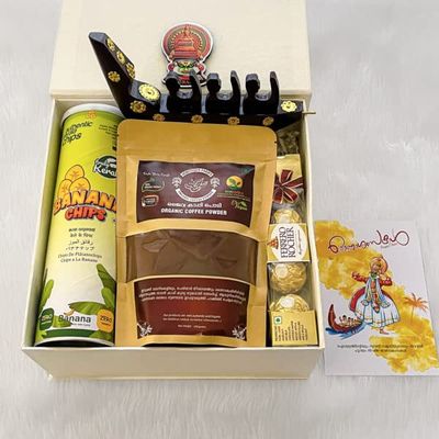 Angroos Traditional Onam gifts hamper box with organic coffee powder and hand crafted boat