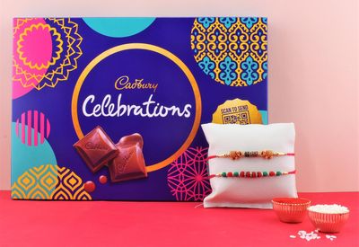 SFU E Com Cadbury Celebration Gift Box with Set Of 2 Rakhi | Rakhi Chocolate For Brother | Rakhi with Chocolates| Roli, Chawal, Chandan, Misri | 18