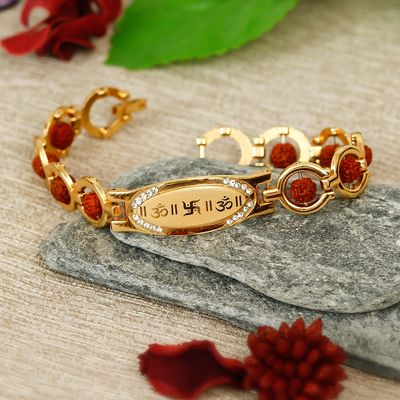 eCraftIndia,Bracelet Religious Rakhi with Cadbury Celebrations Gift Pack of 11 Assorted Chocolates and Roli Chawal Pack, Raksha Bandhan Greeting Card