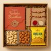 Bay Nut Rakhi Hamper for Brother (Combo - Cashew 50gm,Almonds 50gm.Rolichawal, bhujia, 1 card and 2 Assorted rakhi) view 1