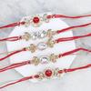 Kaameri Bazaar Rakhi for Brother combo with chocolate - Set of 5 Rakhi with 4 PC Dark chocolate Gift Pack Greeting Card and Roli Chawal - Rakhi Gift for Brother - Crystal rakhi view 2