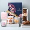 FlowerAura Premium Gift Hamper of Tea Cake, Cookies, Scented Candle & 4 Choco Balls Gift For Birthday | Anniversary | Love | Girlfriend's Day | Mothers Day Gift For Mom (Same Day Delivery) view 3