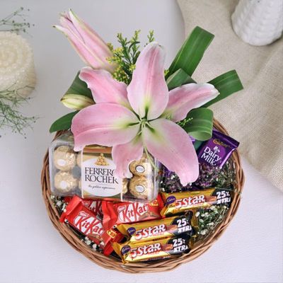 FlowerAura Hampers Include 1 Lily, 8 Chocolates & Pack of 16 Choco Rolls In Basket For Valentine's Day Gift, Birthday Gift, Anniversary Gift & Mother's Day Gift, Father's Day Gift (Same Day Delivery)