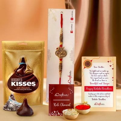 eCraftIndia Golden Lord Ganesha Om Designer Rakhi for Brother with Chocolate, Cadbury Celebrations Gift Pack of 5 Assorted Chocolates, Rakhi with Chocolate Gift - Roli Chawal Pack
