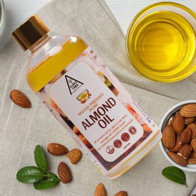 AuraTree Cold Pressed Almond Oil (Badam Tel) Made with California Almonds Baby Massage Oil, Face & Hair Growth Oil| Rich in Vitamiv E & Omega-3 | Body Massage Oil for Glowing Skin 100ML