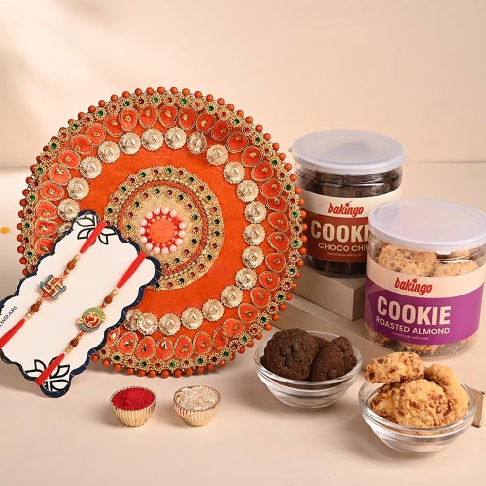 FlowerAura Raksha Bandhan Celebrations Set of 2 Divine Rakhi & Stones Border Engraved Vibrant Tika Thali With Almond Cookie & Choco Chip Cookie - Rakhi for Brother, Bhai, Cousins & Raksha Bandhan Gift