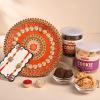 FlowerAura Raksha Bandhan Celebrations Set of 2 Divine Rakhi & Stones Border Engraved Vibrant Tika Thali With Almond Cookie & Choco Chip Cookie - Rakhi for Brother, Bhai, Cousins & Raksha Bandhan Gift view 1