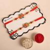 FlowerAura Raksha Bandhan Celebrations Set of 2 Divine Rakhi & Stones Border Engraved Vibrant Tika Thali With Almond Cookie & Choco Chip Cookie - Rakhi for Brother, Bhai, Cousins & Raksha Bandhan Gift view 2