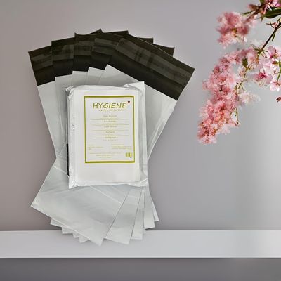 HYGIENE Leakproof Sanitary Disposal Bags Pack of 4 (25 Bags Per Pack, Total 100 Bags) for Used Sanitary Pads, Baby Diapers, Panty Liner, Tampons, Condoms (Black and White, Small 5"x10")