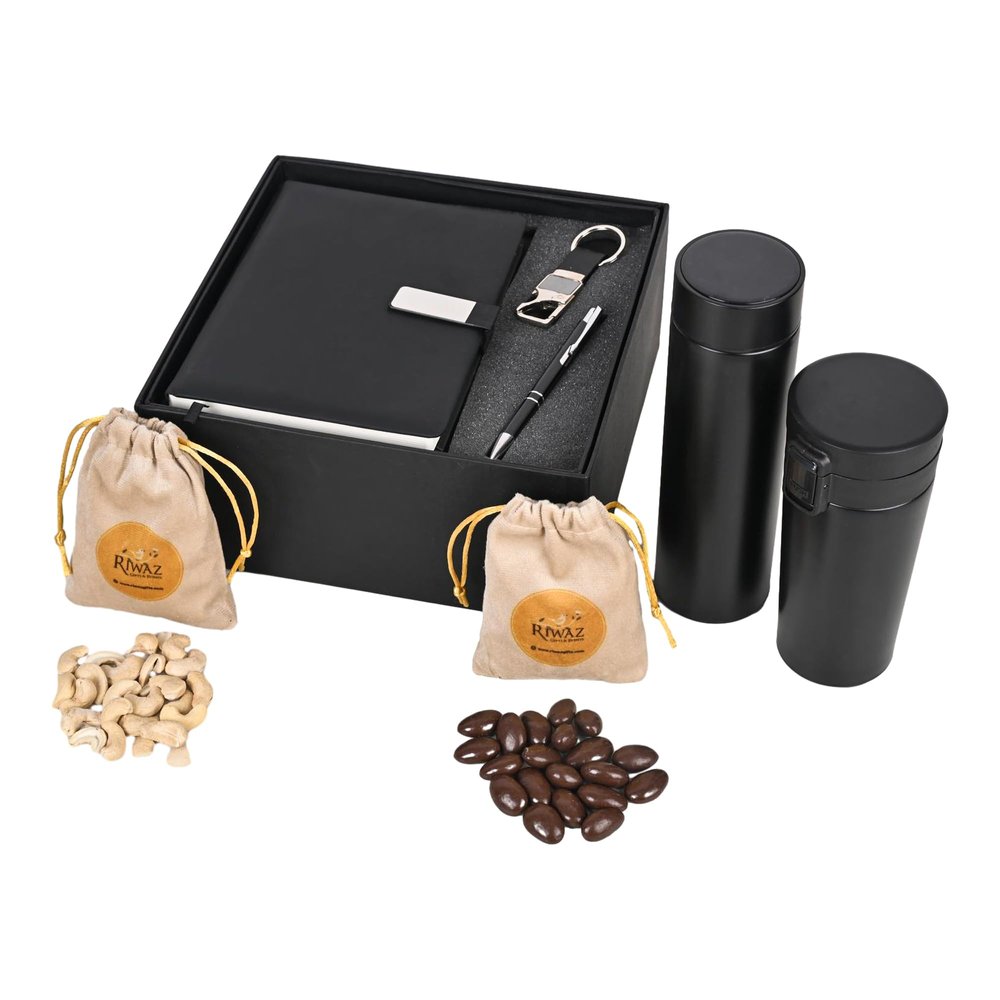 Riwaz Executive Corporate Gift Hamper for Diwali | Elegant Potli Bag with Dairy, Pen, Smart Tumbler Bottle, Keychain, Chocodip Almonds & Roasted Cashews
