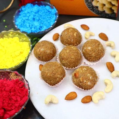 Blessing Decor Sweet Holi Surprise - Delicious Gondh Laddu & 3 Cheerful Herbal Gulal Colors Easy wipe and No harm for the skin.(200 Grams Gondh Laddu and 3 Organic Colour)
