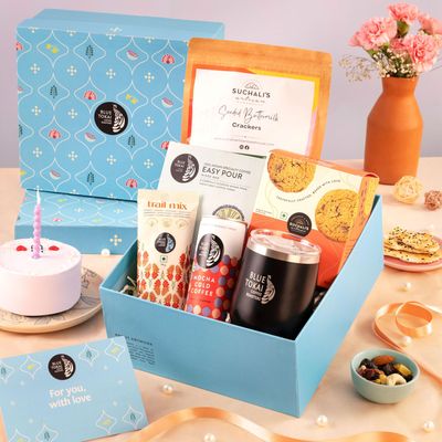 Blue Tokai Coffee Roasters Festive Phalgun Gift Hamper | Assorted Hamper for Coffee Lovers | Celler Mug, Can, Trail Mix, Crakers & Coffee Gifts| Premium Coffee Hamper