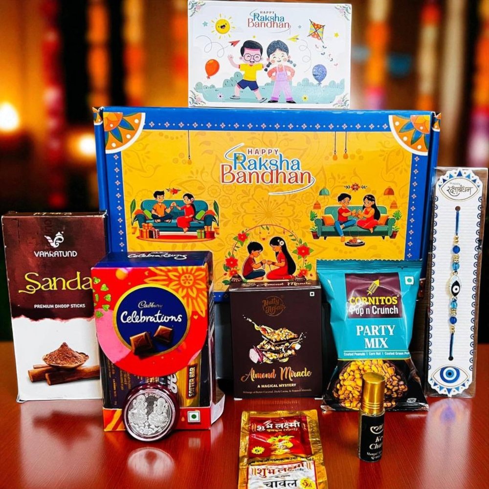 SOULWARE Rakhi Gift Combo Box for Brother Bhaiya & Bhabhi-9 Inclusions + Evil Eye Rakhi Nazar Kavach|Chocolate,Millet Namkeen,Almond Bar,Incense Sticks & Stand,Perfume,Coin,Card,Roli Chawall