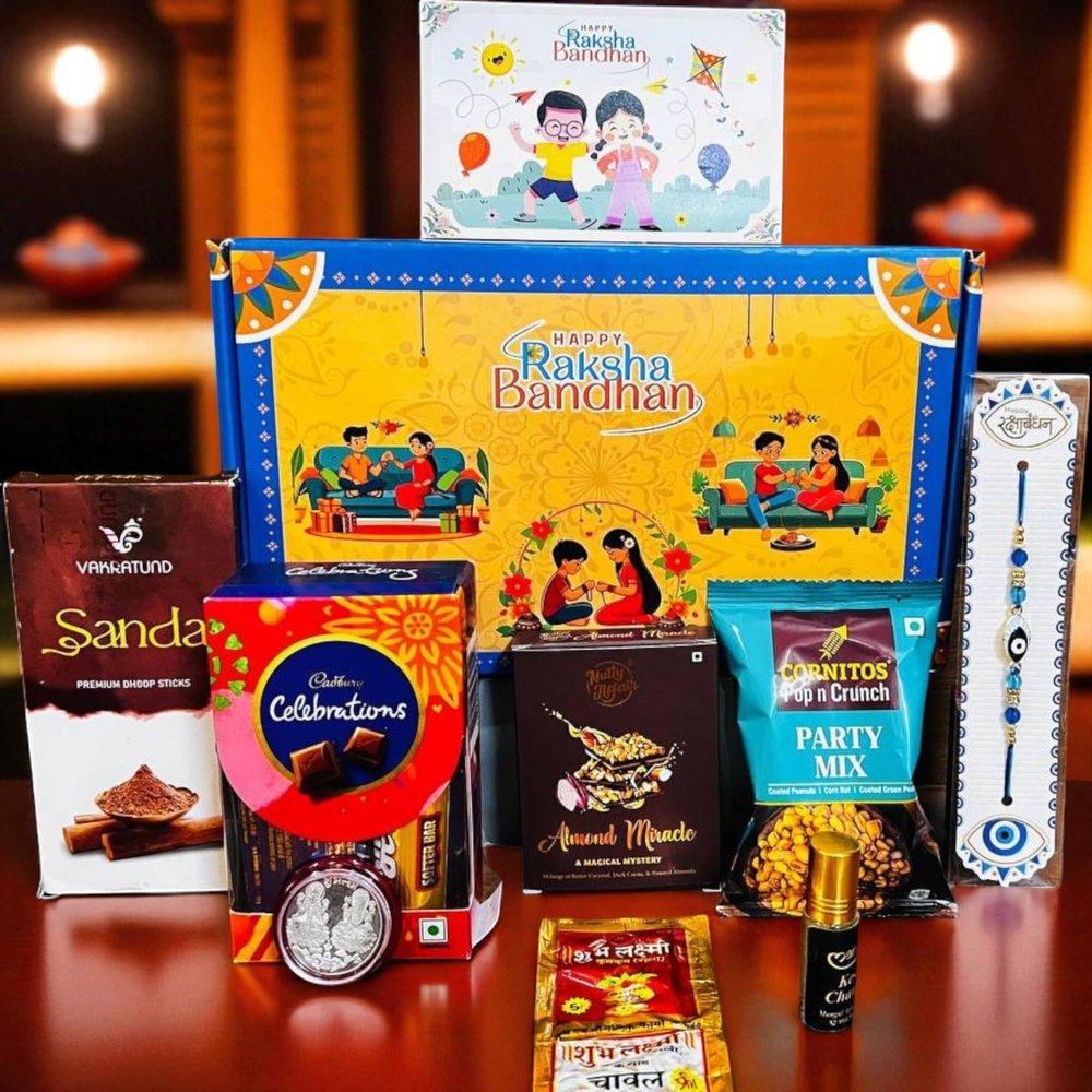 MOBINA Rakhi Gift Combo Box for Brother Bhaiya & Bhabhi-9 Inclusions + Evil Eye Rakhi Nazar Kavach|Chocolate,Millet Namkeen,Almond Bar,Incense Sticks & Stand,Perfume,Coin,Card,Roli Chawall
