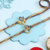 FlowerAura Premium Handcrafted Set Of 2 Spiritual Charm Rakhi With Pack of 16 Choco Balls Include Roli Chawal Set - Rakhi Gift Hamper For Brother, Bhai, Kids, Bhaiya, Cousins view 3