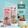 FlowerAura Premium Rakhi For Brother Combo Include Evil Eye Rakhi With BBQ Almonds, Trial Mix, Hazelnut Rocks & Roli Chawal Set - Rakhi Gift For Brother, Bhai, Cousins, Kids (Same Day Delivery) view 2