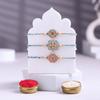 FlowerAura Premium Rakhi For Brother Combo Include Set of 3 Pastel Bloom Rakhi With Almonds Rock, Cadbury Box, Lucky Bamboo Plant In Coffee Mug & Roli Chawal Set (Same Day Delivery) view 4