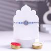 FlowerAura Premium Rakhi For Brother Combo Include Blue Beaded Evil Eye Rakhi With Chocolate Box & Live Indoor Money Plant In Pot & Roli Chawal Set - Rakhi Gift For Brother, Bhai (Same Day Delivery) view 3