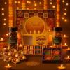 Bay Nut Luxury Diwali Gift Hamper with Chocolate 125gm, choco almond 100gm, 4 wax filled Diyas,2 laltern, urli, roasted makhana and Greeting Card view 2